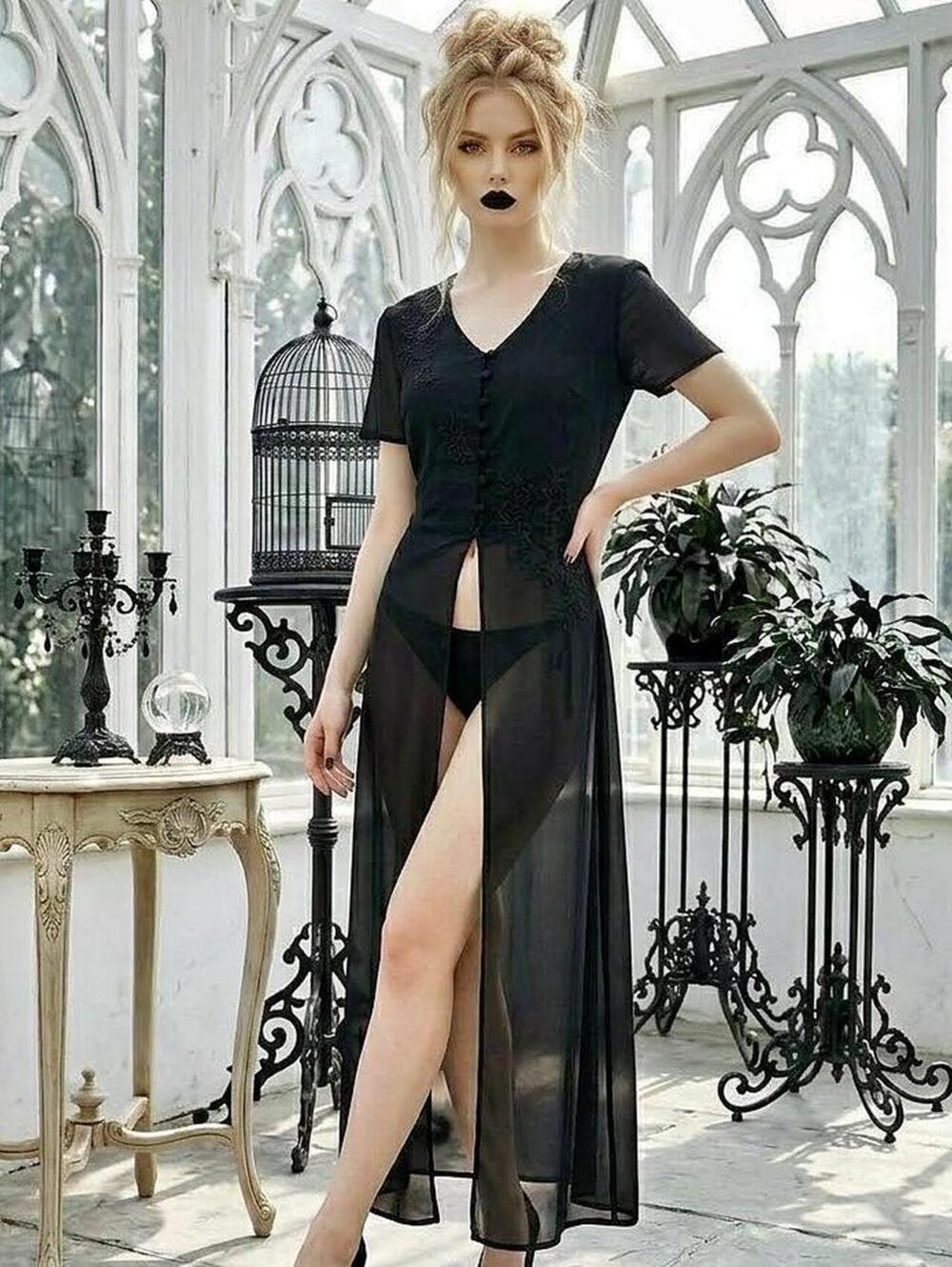 Dressbarn black duster with sheer overlay and button-up front. Size: 6